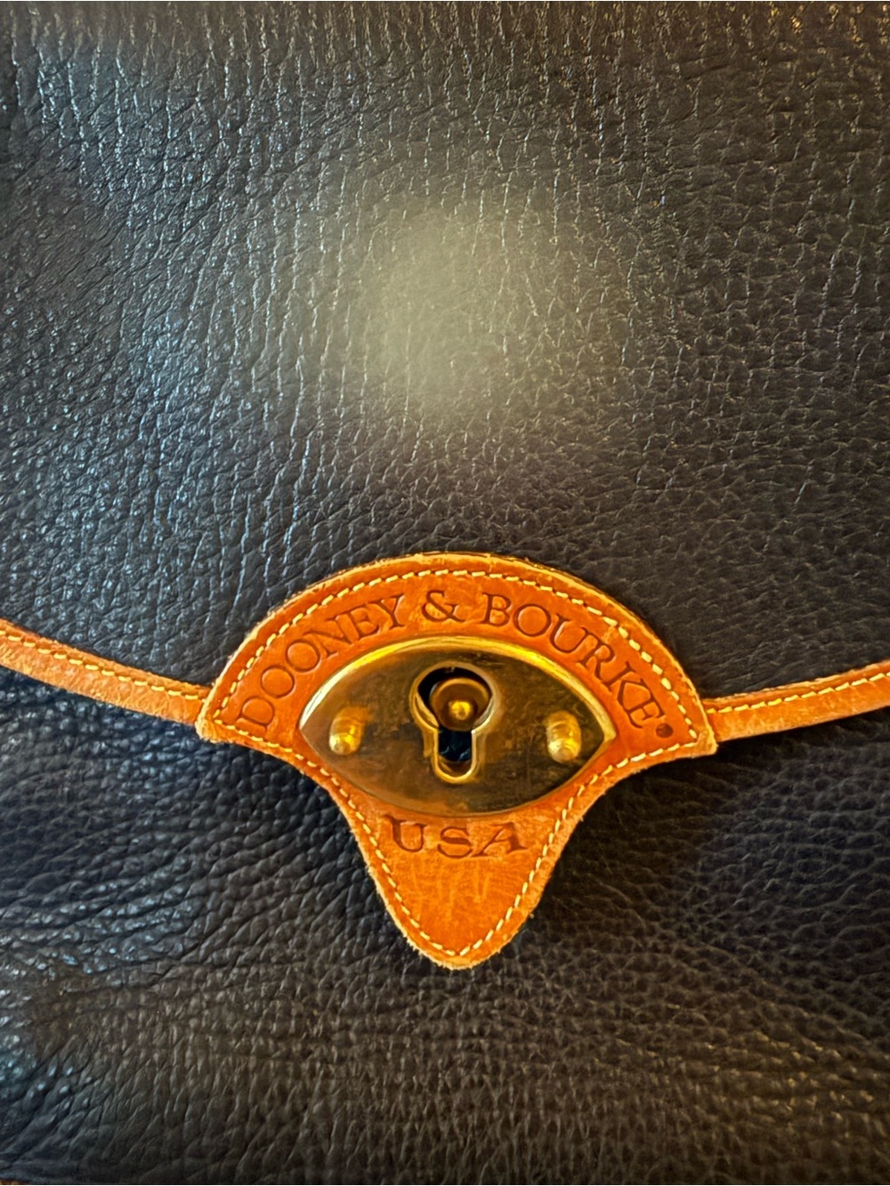 Dooney & Bourke navy Leather Shoulder Bag with Tan Trim and Brass Hardware